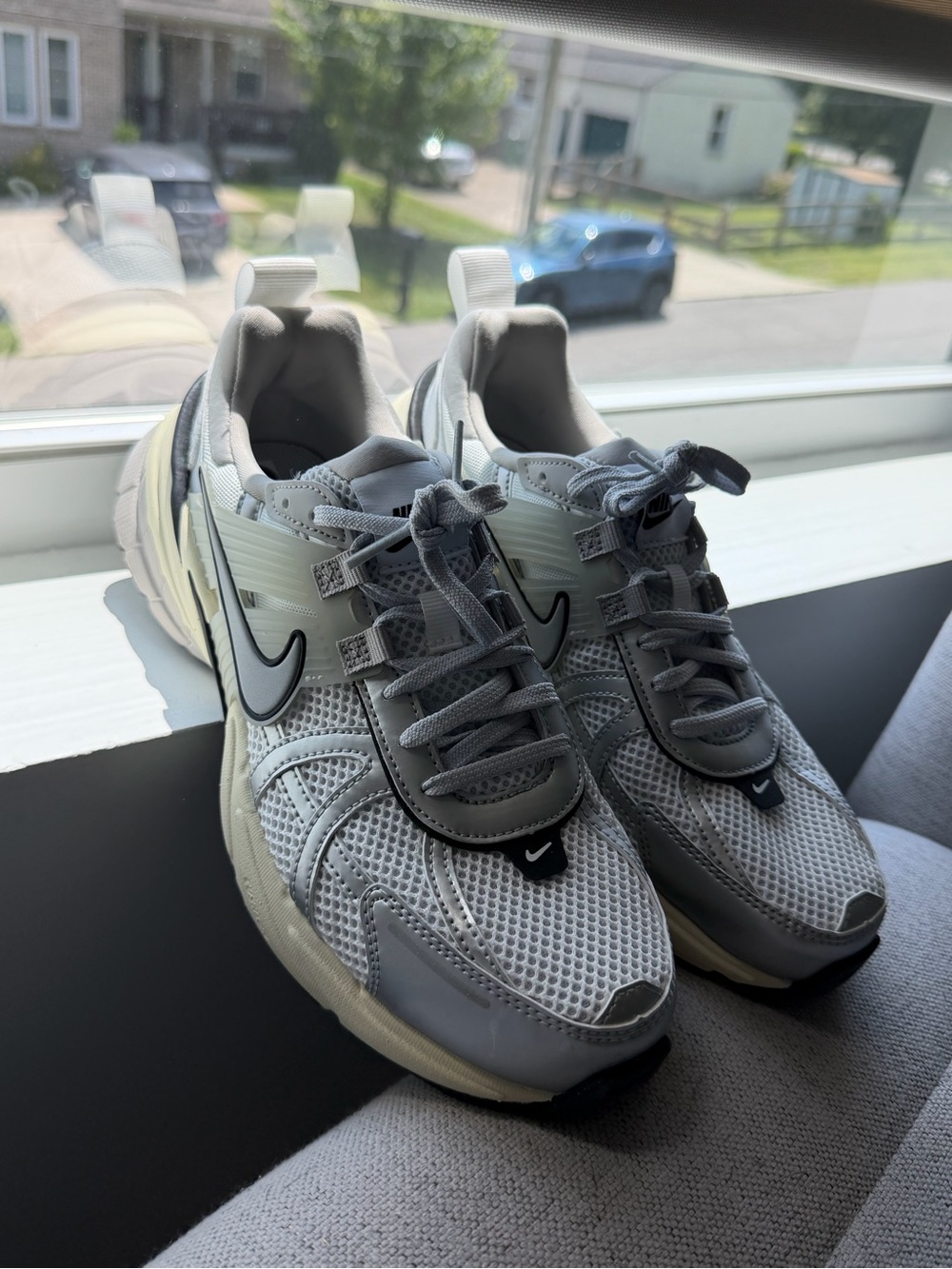 Nike V2K Run Sneakers in Summit White & Metallic Silver Accents